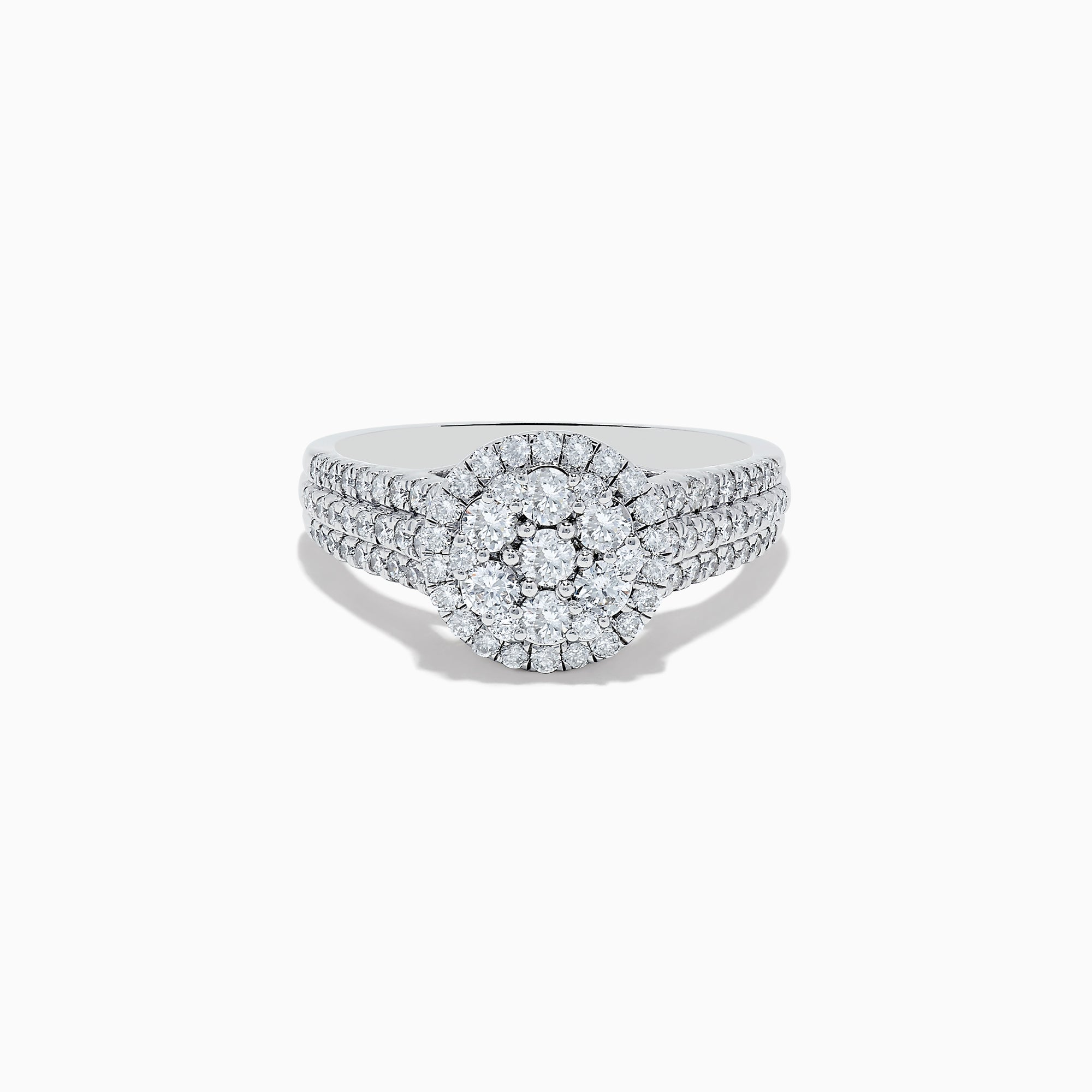 The 14K White Gold Diamond Cluster Ring, 0.95 TCW, features a round center cluster, double diamond halos, and a triple-row band for exceptional brilliance.