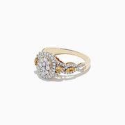 A 14K Yellow Gold ring showcasing white and fancy yellow diamonds in an oval cluster design, with a total carat weight of 1.00 TCW.