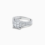 The 14K White Gold Diamond Ring, 1.50 TCW, showcases a square diamond cluster center and sparkling diamonds on a split shank band, all set against a plain white background for an elegant look.