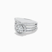 The Bouquet 14K White Gold Diamond Ring showcases a circular cluster of diamonds at the center, surrounded by a diamond halo and set on a split shank band adorned with additional diamonds.