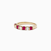 The Ruby Royale 14K Yellow Gold Ruby and Diamond Band, 0.82 TCW, showcases alternating oval diamonds and rectangular red rubies in a row across the top against a white background.