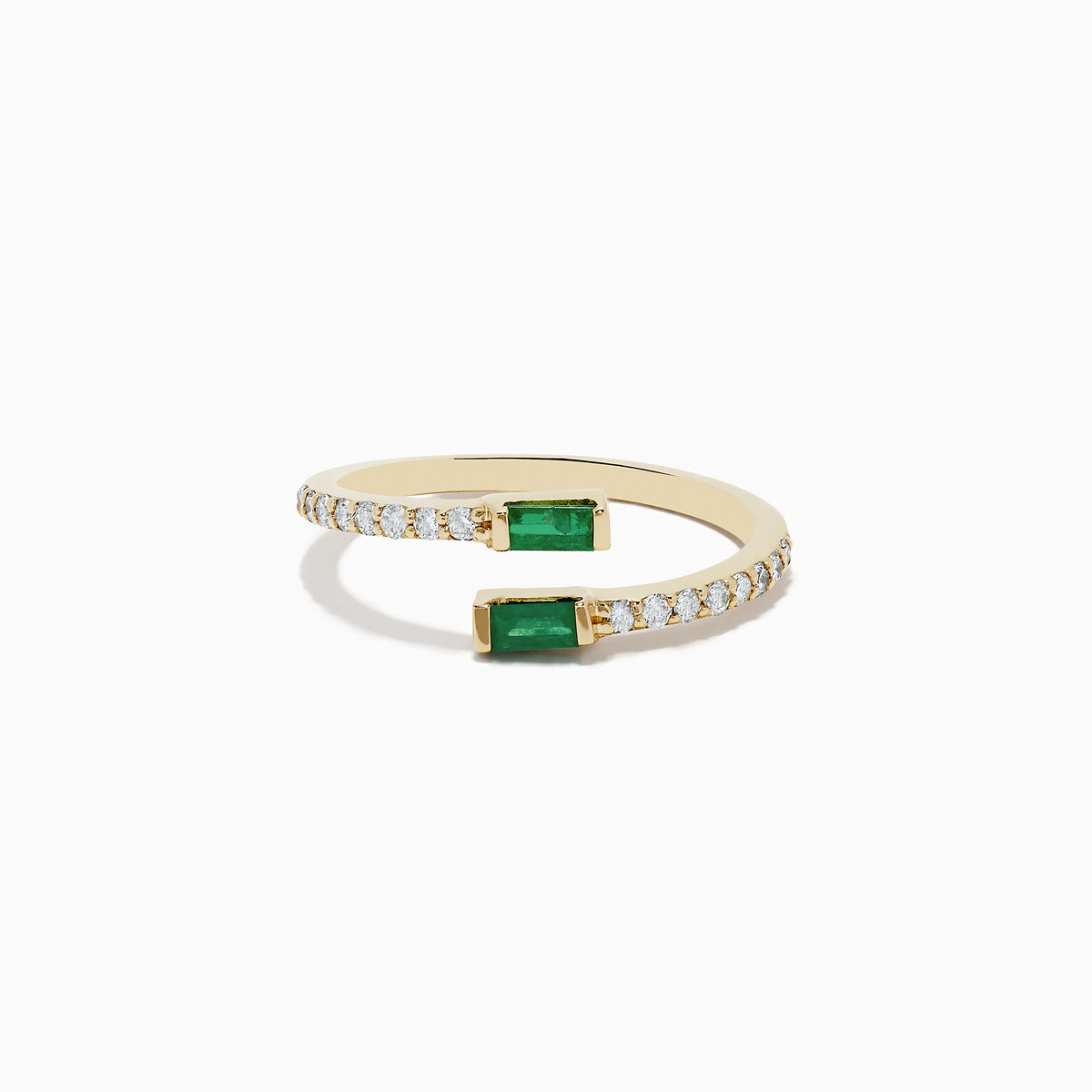 The 14K Yellow Gold Emerald and Diamond Bypass Ring features two rectangular emeralds at each open end, accented by small diamonds along part of the band.
