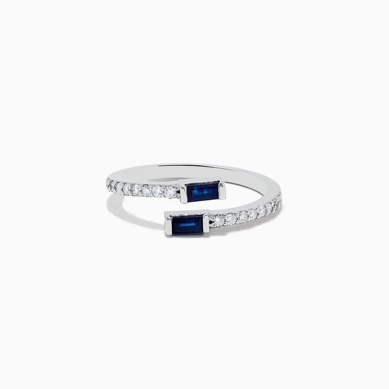 The Royale Bleu 14K White Gold Sapphire and Diamond Ring features two rectangular sapphires at each open end, accented with a row of sparkling diamonds along the band. The elegant design is displayed on a plain white background.