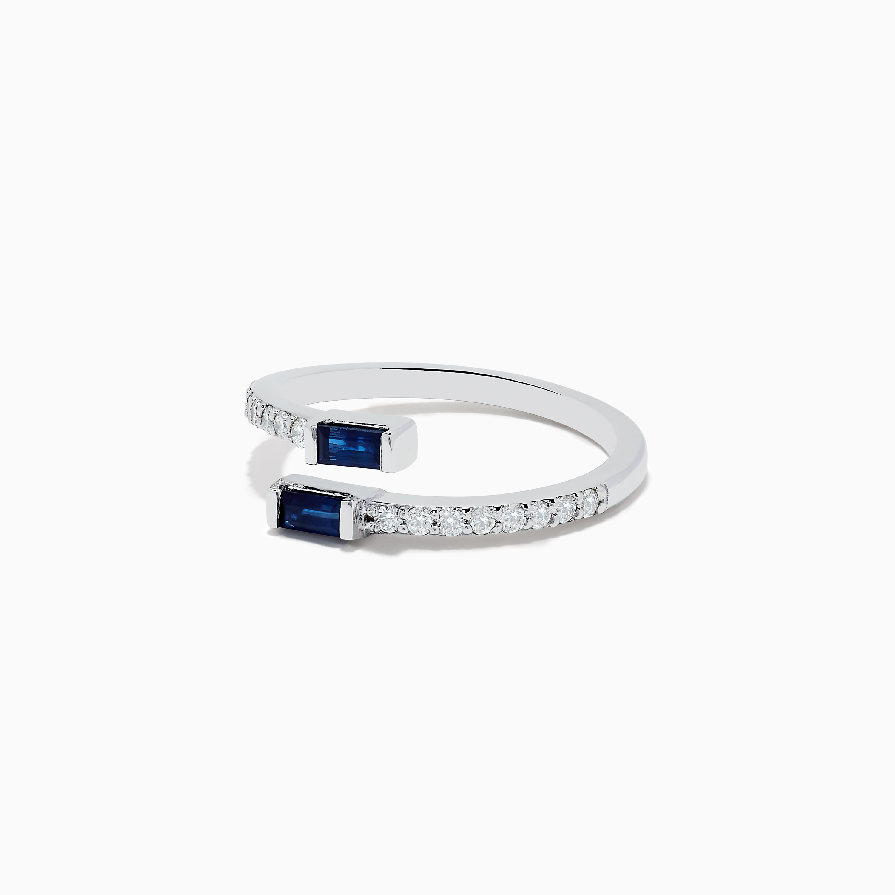 The Royale Bleu 14K White Gold Sapphire and Diamond Ring features two rectangular sapphires at each open end, accented with a row of sparkling diamonds along the band. The elegant design is displayed on a plain white background.