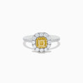 The Canare 14K Two Tone Gold Yellow and White Diamond Ring features a square yellow diamond center, framed by a double halo of white diamonds and accented with diamonds on the band.