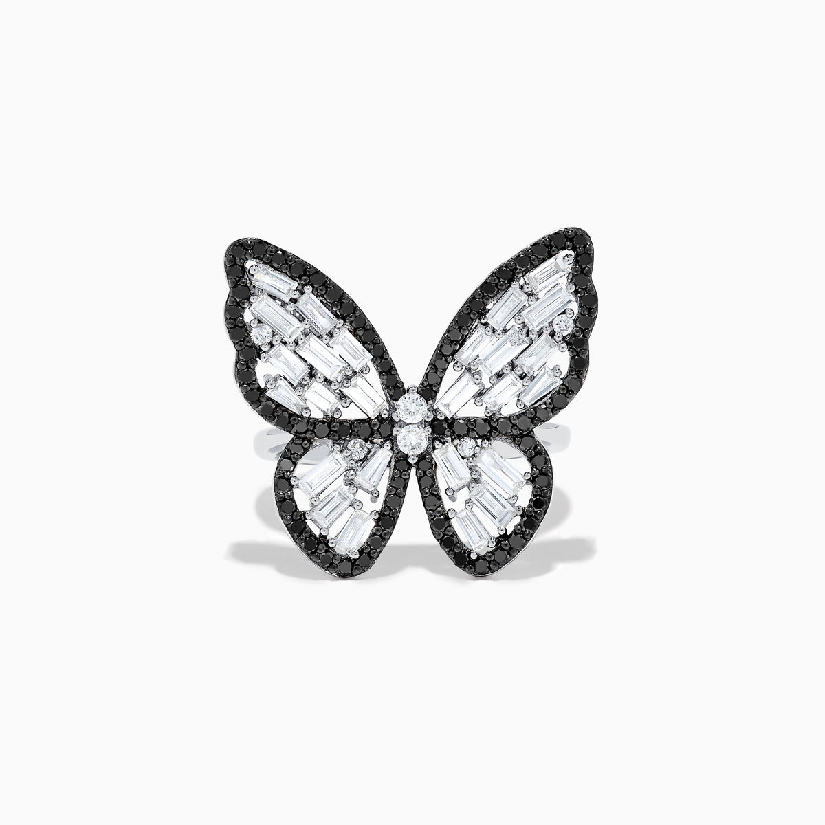 The Nature 14K White Gold Black and White Diamond Butterfly Ring features clear baguette-cut gemstones and sparkling diamond-outlined wings, all set on a gleaming silver band against a white background.
