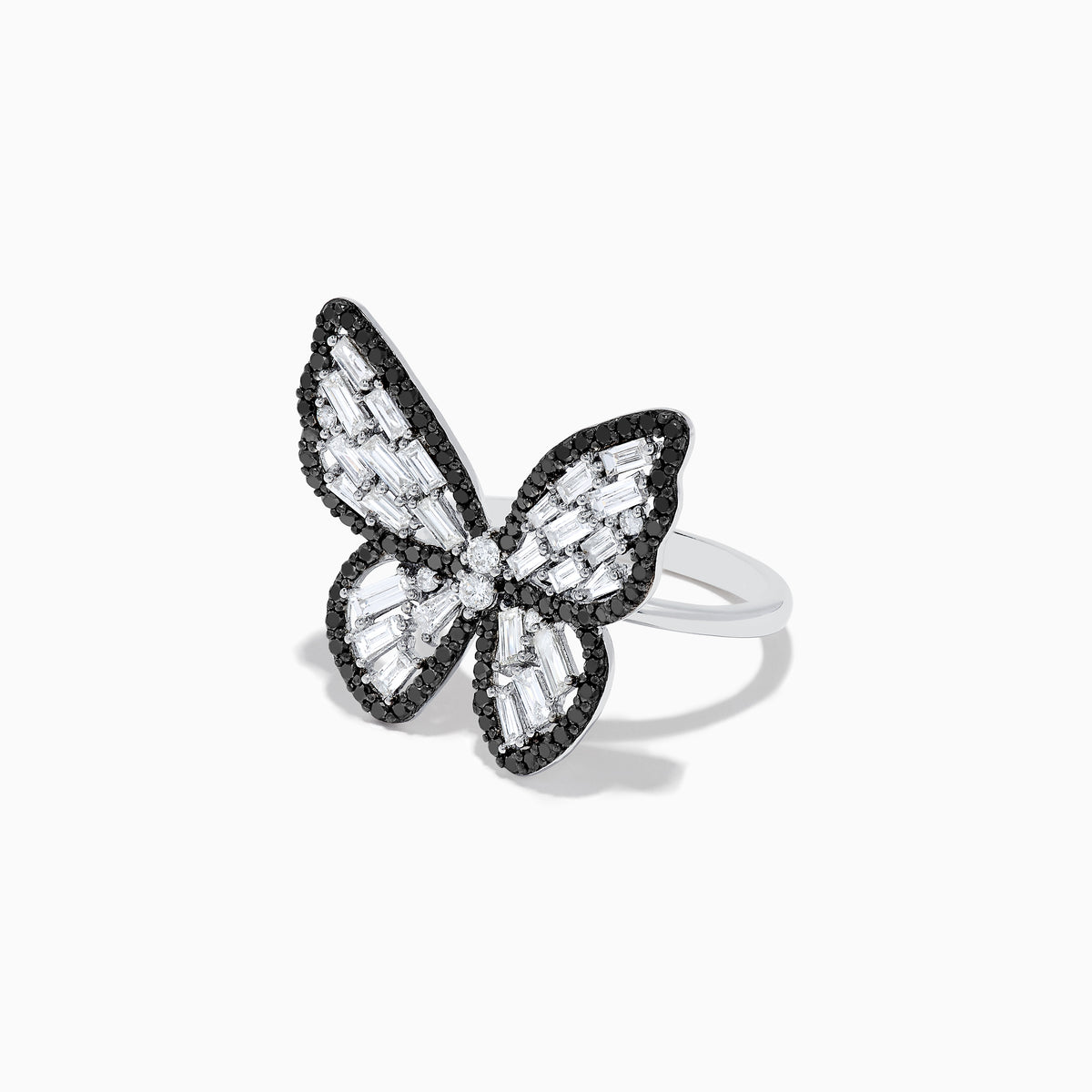 The Nature 14K White Gold Black and White Diamond Butterfly Ring features clear baguette-cut gemstones and sparkling diamond-outlined wings, all set on a gleaming silver band against a white background.