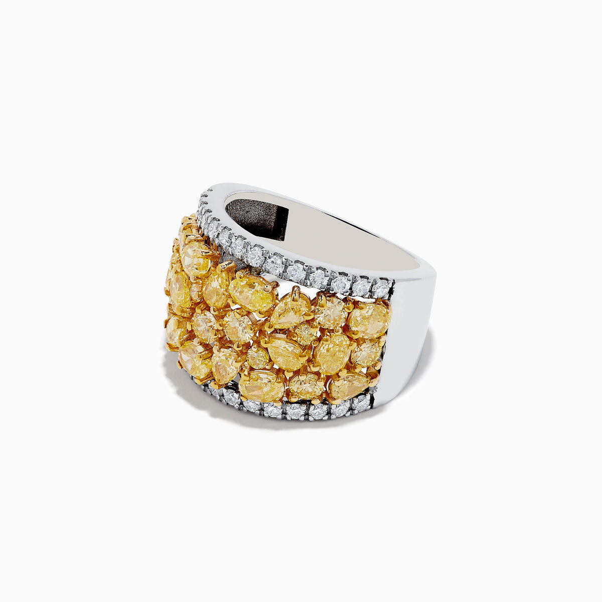 The 14K Two-Tone Gold Multi Shaped Yellow Diamond Statement Ring 4.11 TCW showcases clustered yellow diamonds at the center, bordered by white diamonds on the top and bottom, all set in a sleek two-tone gold band.