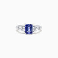 The Nahla Siri 14K White Gold Tanzanite and Diamond Ring, 1.51 TCW, features a rectangular tanzanite center stone accented by two small diamonds and tapered baguette diamonds on each side, set on a polished band.