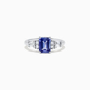 The Nahla Siri 14K White Gold Tanzanite and Diamond Ring, 1.51 TCW, features a rectangular tanzanite center stone accented by two small diamonds and tapered baguette diamonds on each side, set on a polished band.