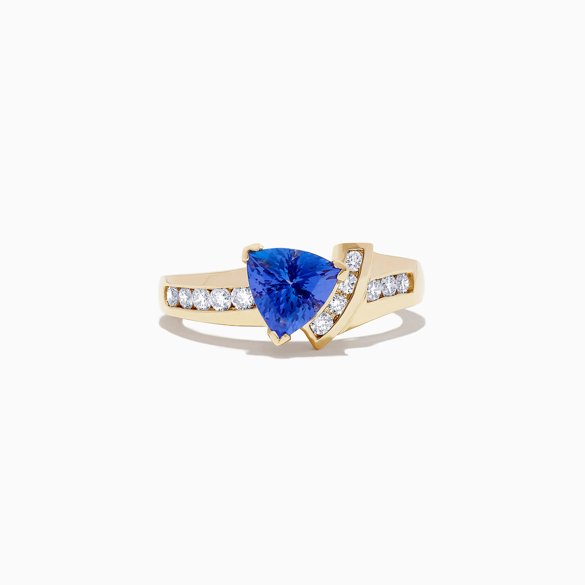 The Nahla Siri 14K Yellow Gold Tanzanite and Diamond Ring, 1.40 TCW, features a striking triangular tanzanite centerpiece accented by rows of round diamonds along both sides of the band.