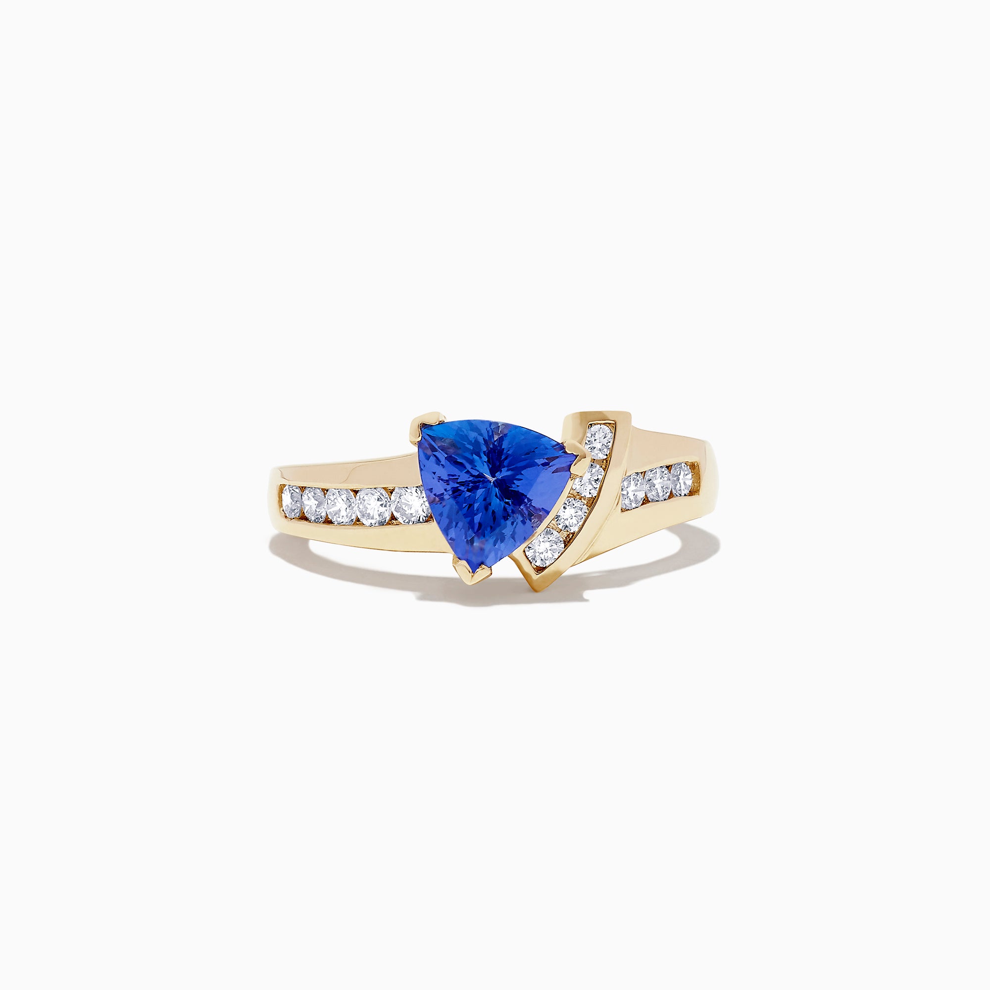 The Nahla Siri 14K Yellow Gold Tanzanite and Diamond Ring, 1.40 TCW, features a striking triangular tanzanite centerpiece accented by rows of round diamonds along both sides of the band.