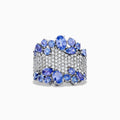 The Nahla Siri 14K White Gold Tanzanite and Diamond Ring, 4.38 TCW, features sparkling diamonds at the center, bordered by oval and round tanzanites for a luxurious design.