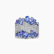 The Nahla Siri 14K White Gold Tanzanite and Diamond Ring, 4.38 TCW, features sparkling diamonds at the center, bordered by oval and round tanzanites for a luxurious design.