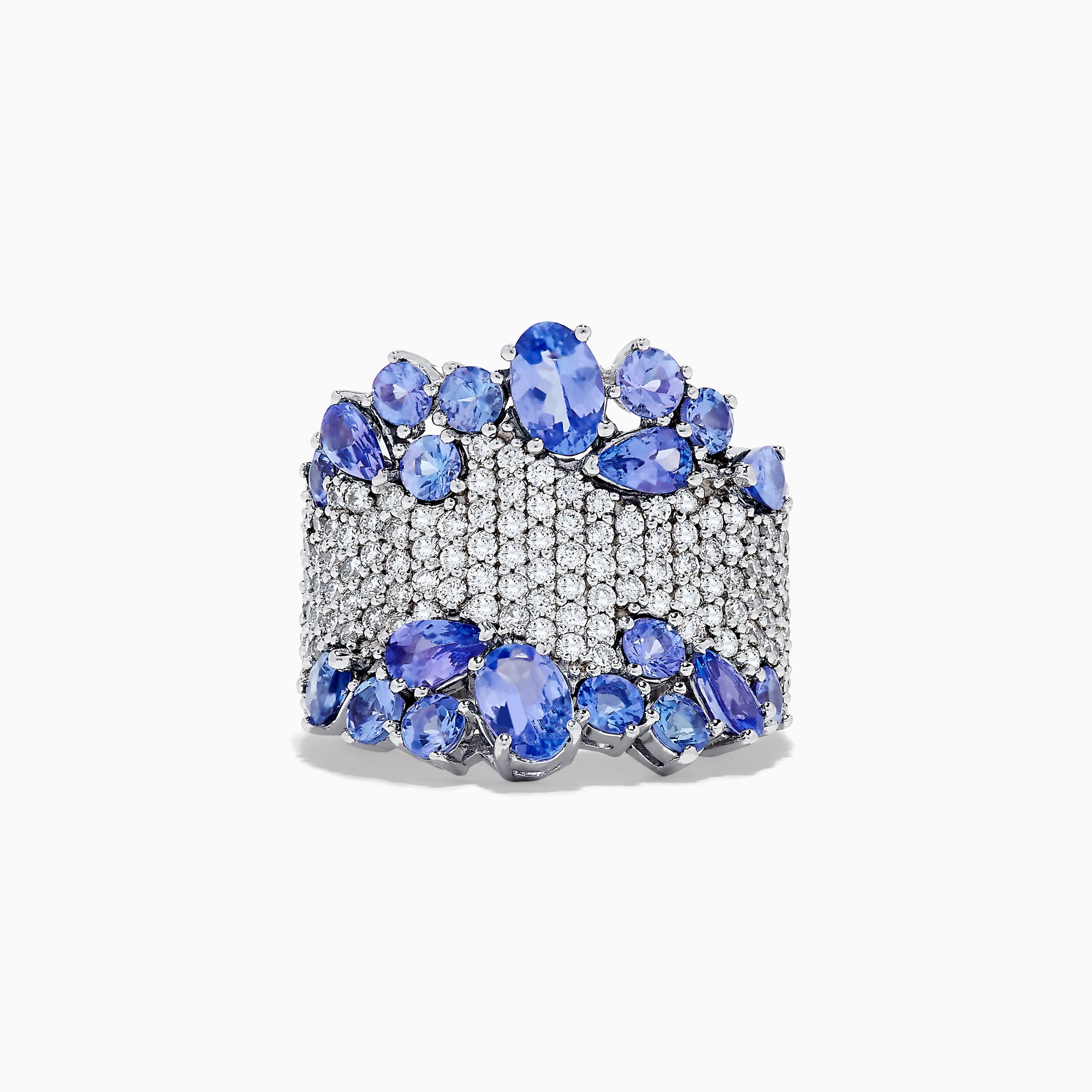 The Nahla Siri 14K White Gold Tanzanite and Diamond Ring, 4.38 TCW, features sparkling diamonds at the center, bordered by oval and round tanzanites for a luxurious design.