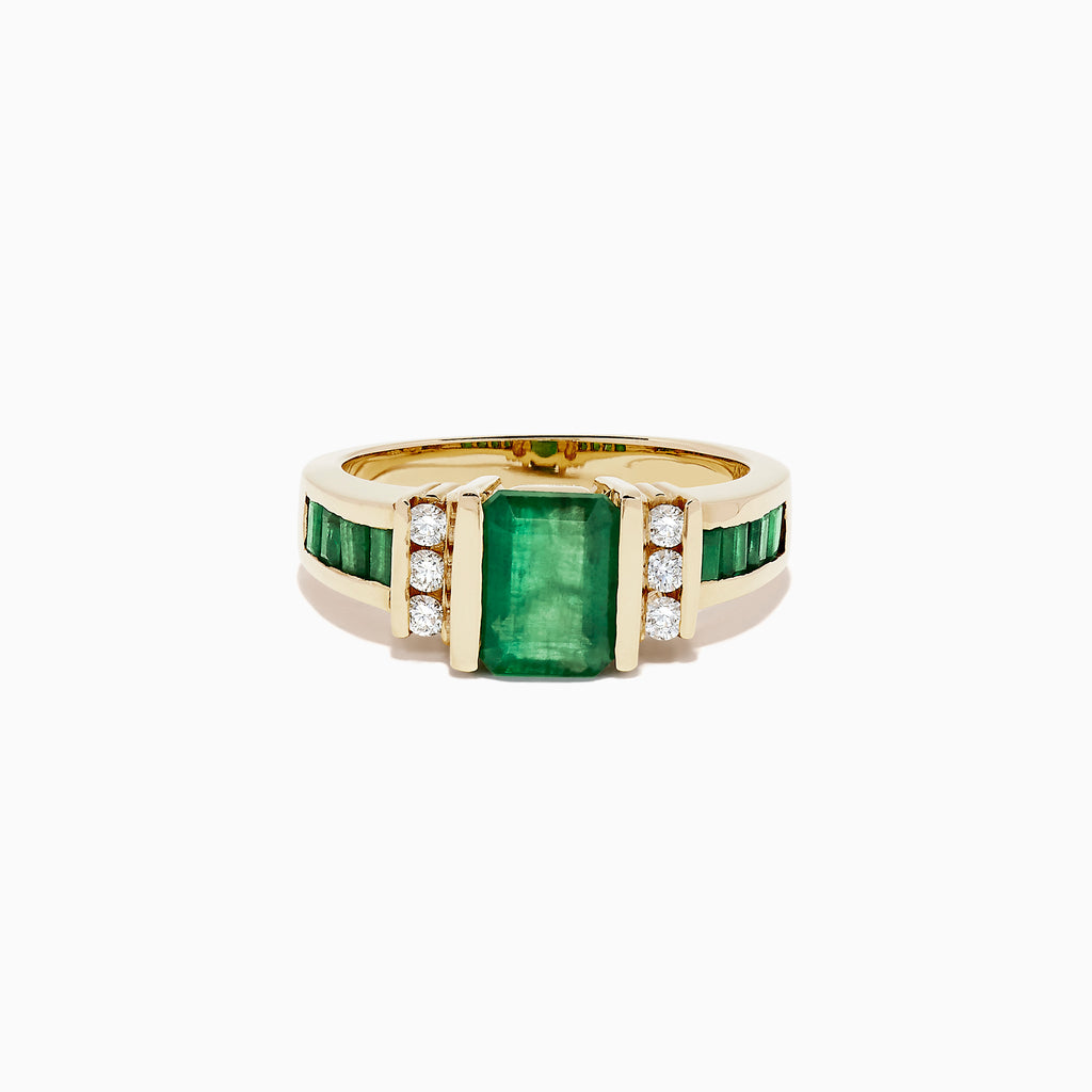The Brasilica 14K Yellow Gold Emerald and Diamond Ring, 2.26 TCW, showcases a large rectangular emerald center with three round diamonds on each side and extra green stones set along the band for added elegance.