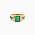 The Brasilica 14K Yellow Gold Emerald and Diamond Ring, 2.26 TCW, showcases a large rectangular emerald center with three round diamonds on each side and extra green stones set along the band for added elegance.