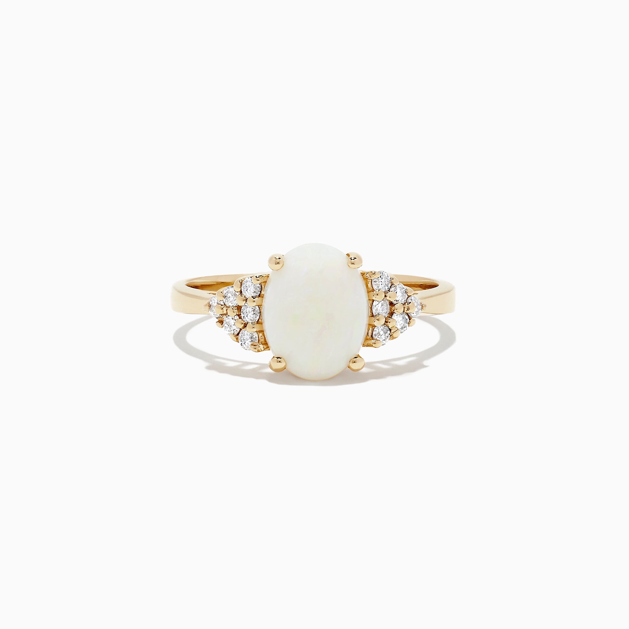 The 14K Yellow Gold Opal and Diamond Ring, 1.13 TCW features an oval white opal center accented by clusters of round diamonds on each side, all set in yellow gold against a white background.