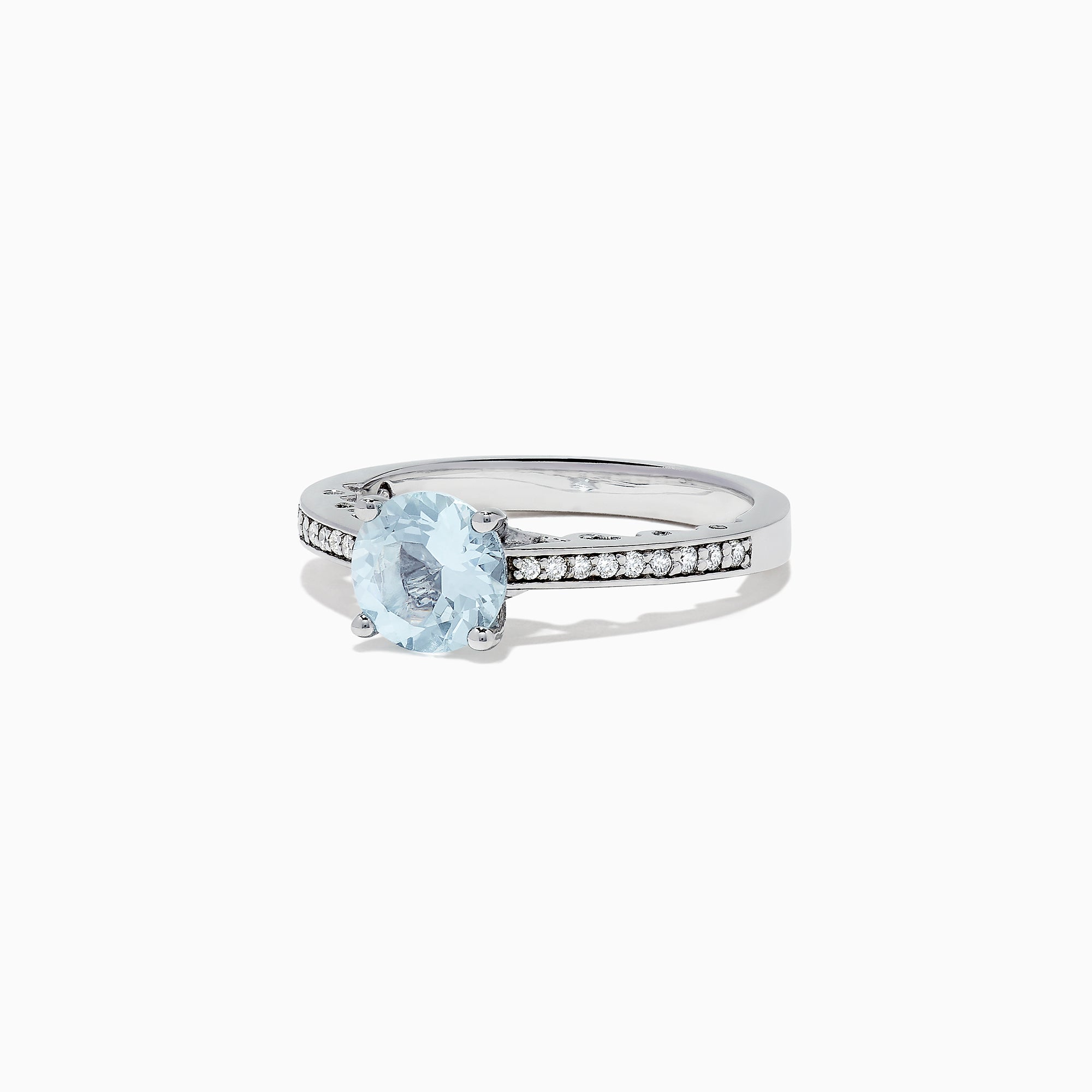 The Aquarius 14K White Gold Aquamarine and Diamond Ring, 1.09 TCW, showcases a round pale blue aquamarine center stone with sparkling diamonds along the band, presented on a white background.