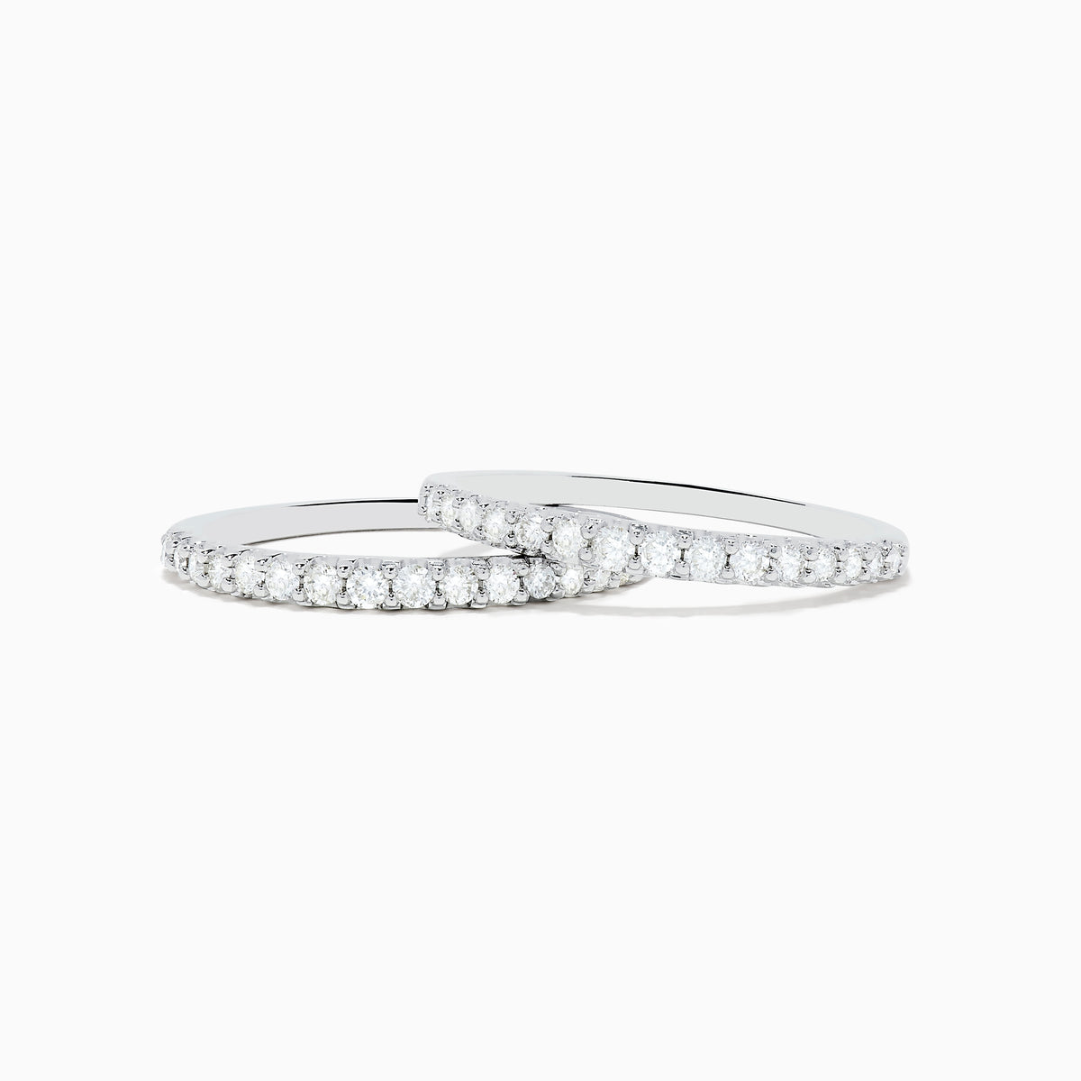 The Bouquet 14K White Gold Diamond Ring Set showcases a large square cluster of round diamonds at the center, with extra diamonds along its multi-band design, set against a white background.