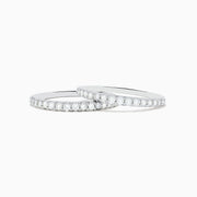 The Bouquet 14K White Gold Diamond Ring Set showcases a large square cluster of round diamonds at the center, with extra diamonds along its multi-band design, set against a white background.