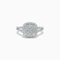 The Pave Classica 14K White Gold Square Diamond Ring 0.97 TCW features a cushion-shaped diamond cluster, a diamond halo, and a split shank pavé band, shown against a white background.