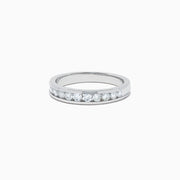 The Bridal 14K White Gold Channel Set Diamond Band, 0.49 TCW, features a row of round, clear diamonds set along the band and is displayed on a white background.