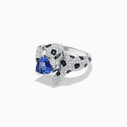 The Signature 14K White Gold Tanzanite and Diamond Panther Ring, 2.07 TCW, features black spots, green eyes, and a blue heart-shaped tanzanite gemstone held in the panther’s mouth.