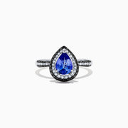 The Nahla Siri 14K White Gold Tanzanite and Diamond Ring, 1.43 TCW, features a pear-shaped blue tanzanite with a halo of white diamonds and diamond accents on the band, displayed on a white background.
