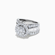 The Bouquet 14K White Gold Diamond Cluster Ring features a large round diamond cluster center, two rows of smaller diamonds, and extra stones along the band for a dazzling 2.51 total carat weight.