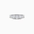 The Bridal 14K White Gold Diamond Three Stone Ring, 0.39 TCW, features three center diamonds with smaller round and baguette-cut stones along the band, shown on a white background.
