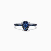 The Signature 14K White Gold Sapphire and Diamond Panther Ring, 0.59 TCW, features a panther head adorned with sapphire-blue accents and green gemstone eyes, shown against a white background.