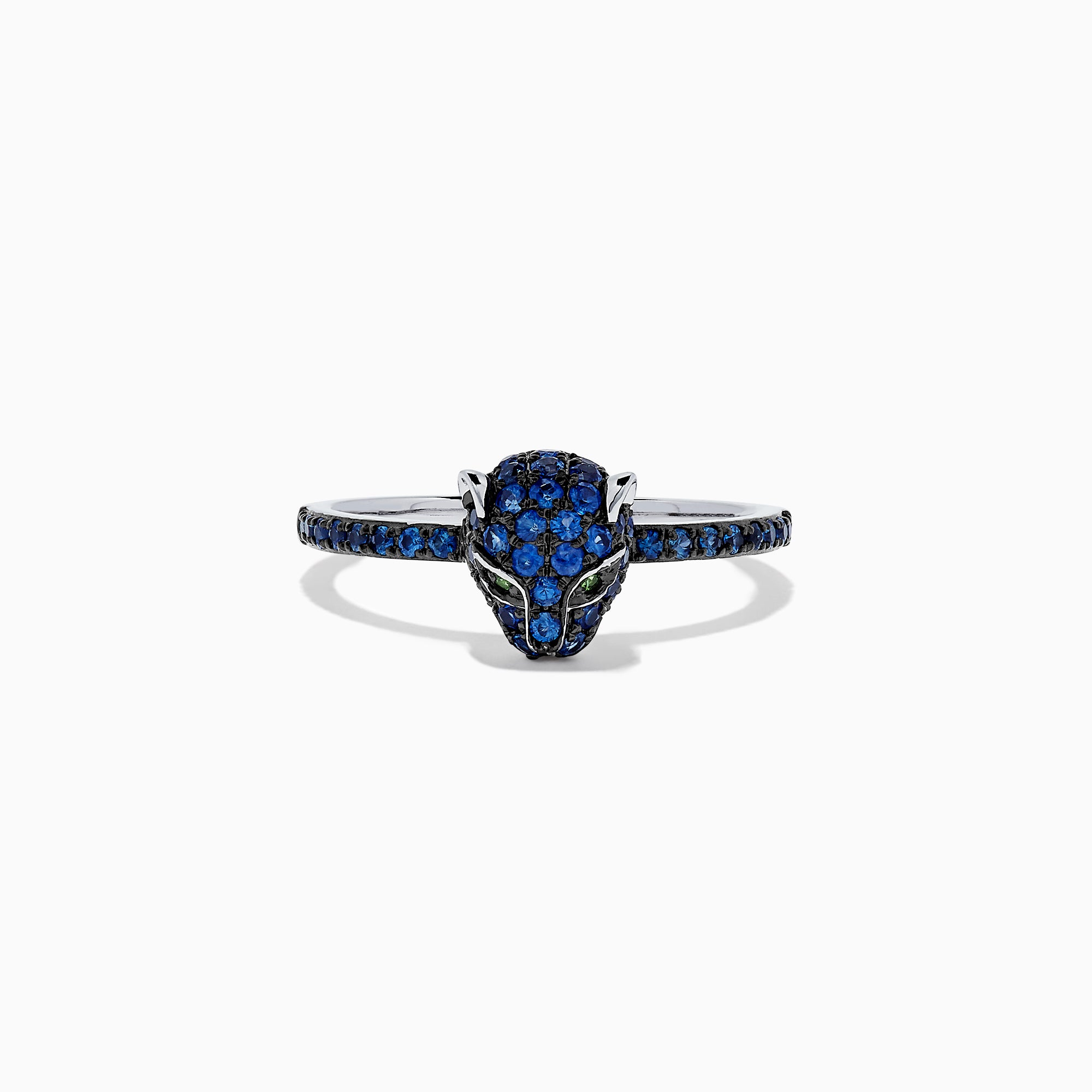 The Signature 14K White Gold Sapphire and Diamond Panther Ring, 0.59 TCW, features a panther head adorned with sapphire-blue accents and green gemstone eyes, shown against a white background.