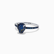 The Signature 14K White Gold Sapphire and Diamond Panther Ring, 0.59 TCW, features a panther head adorned with sapphire-blue accents and green gemstone eyes, shown against a white background.