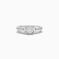 A beautiful Bridal 14K White Gold Diamond Cluster Ring and Band Set, 0.72 TCW, featuring a round central diamond, surrounded by smaller diamonds on a split shank for extra sparkle.
