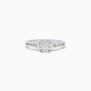 A beautiful Bridal 14K White Gold Diamond Cluster Ring and Band Set, 0.72 TCW, featuring a round central diamond, surrounded by smaller diamonds on a split shank for extra sparkle.