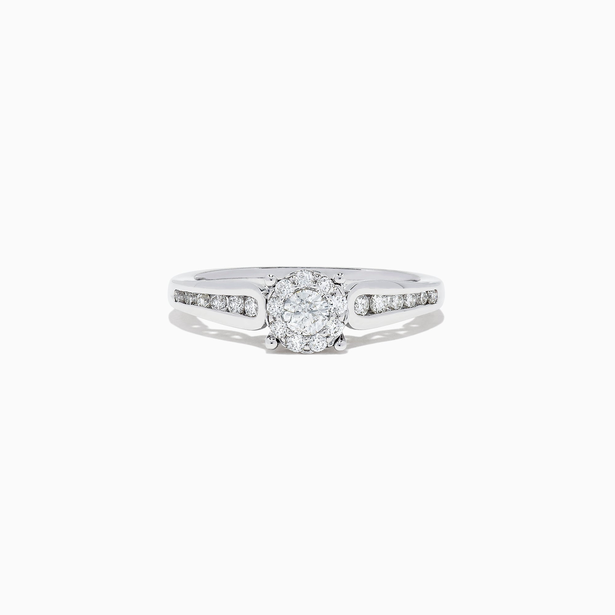 A beautiful Bridal 14K White Gold Diamond Cluster Ring and Band Set, 0.72 TCW, featuring a round central diamond, surrounded by smaller diamonds on a split shank for extra sparkle.