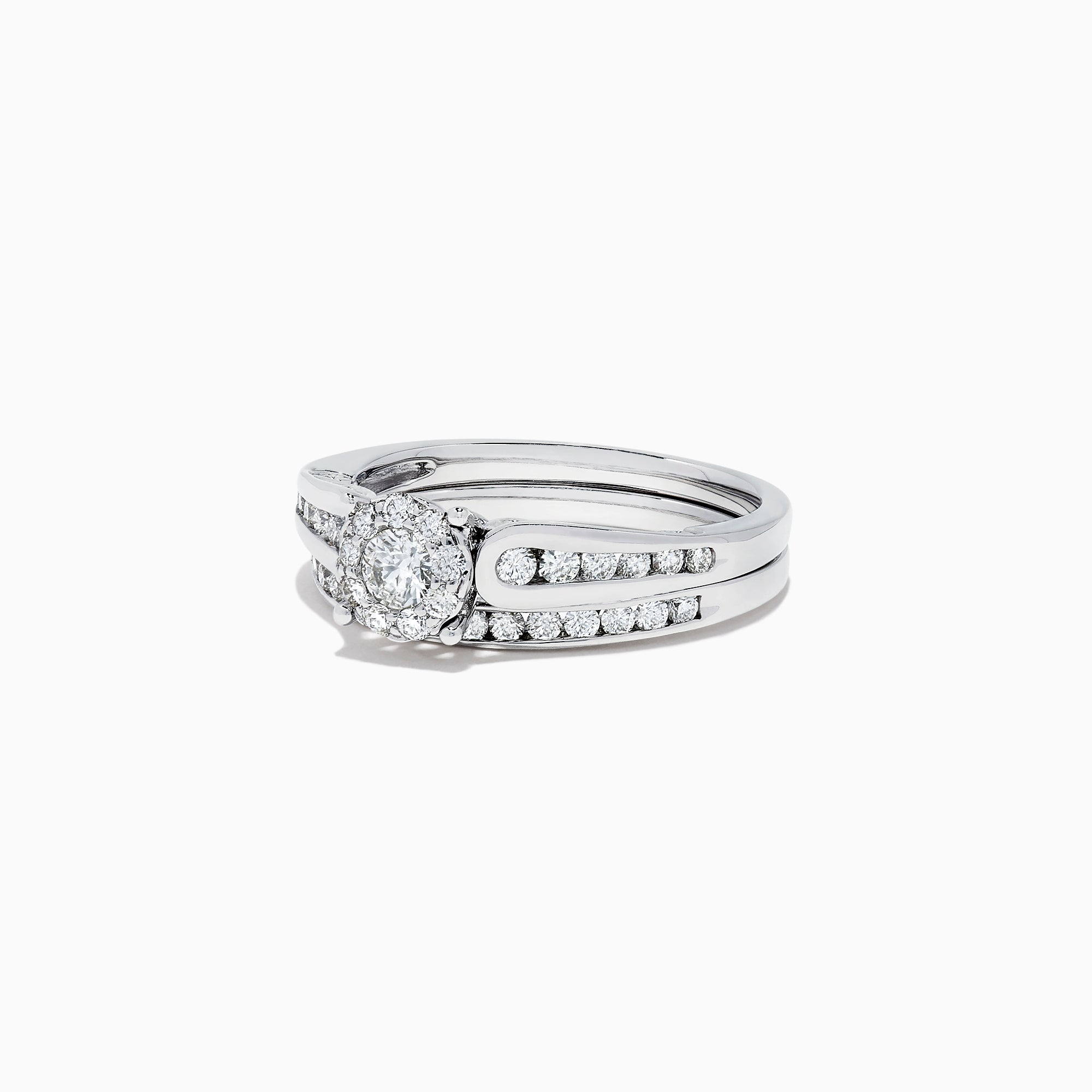 A beautiful Bridal 14K White Gold Diamond Cluster Ring and Band Set, 0.72 TCW, featuring a round central diamond, surrounded by smaller diamonds on a split shank for extra sparkle.