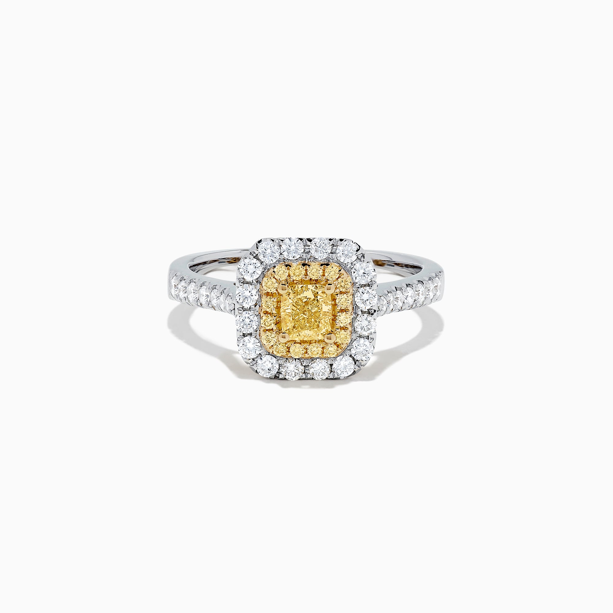 The Canare 18K Two Tone Gold Cushion Double Halo Yellow Diamond Ring, 0.97 TCW, features a square yellow diamond center with double white diamond halos and additional diamonds on the band.