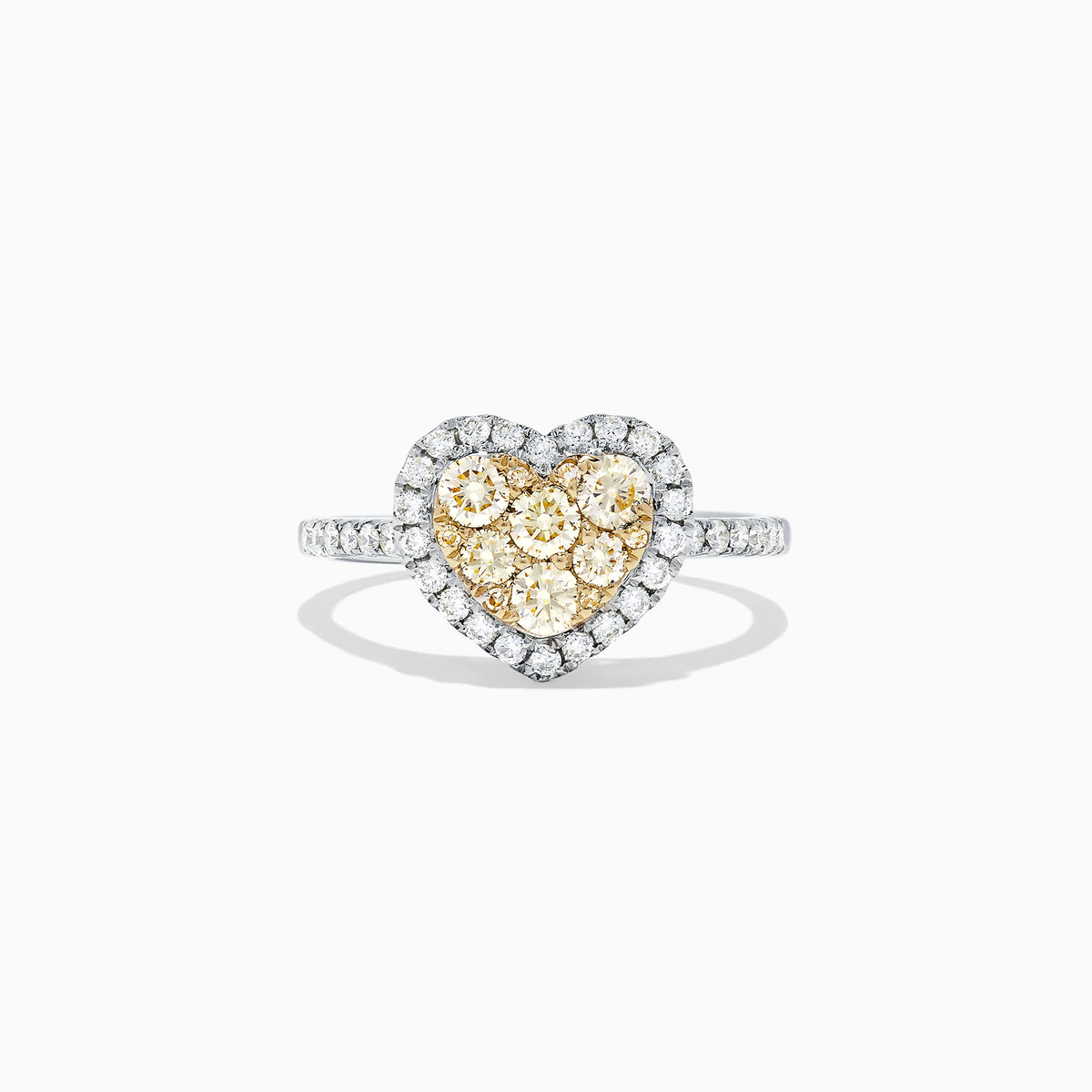 The Canare 14K Two Tone Gold Heart Shaped Yellow Diamond Heart Ring (0.77 TCW) features clustered yellow diamonds at the center, a halo of white diamonds, and a diamond-encrusted two tone gold band, shown on a white background.