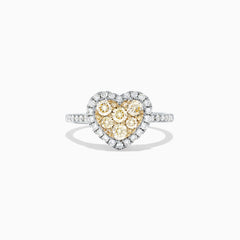 The Canare 14K Two Tone Gold Heart Shaped Yellow Diamond Heart Ring (0.77 TCW) features clustered yellow diamonds at the center, a halo of white diamonds, and a diamond-encrusted two tone gold band, shown on a white background.