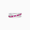 The Ruby Royale 14K White Gold Ruby and Diamond Crossover Band features a wavy, intertwined design with alternating square-cut rubies and round diamonds.