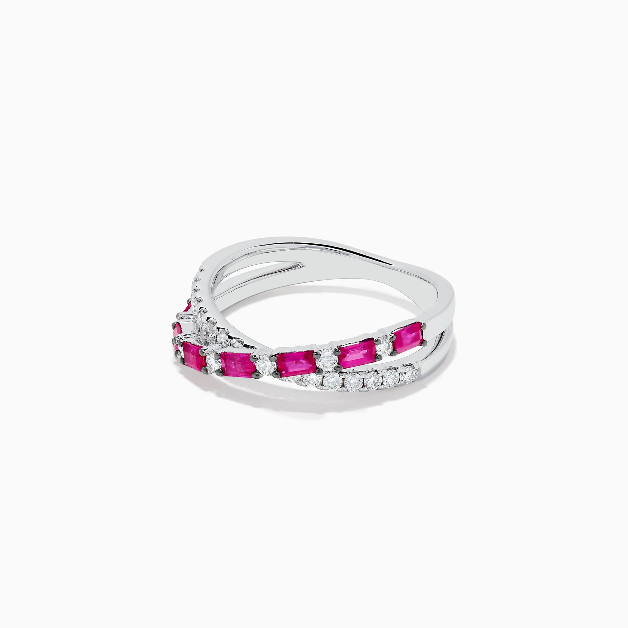 The Ruby Royale 14K White Gold Ruby and Diamond Crossover Band features a wavy, intertwined design with alternating square-cut rubies and round diamonds.