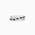 The Royale Bleu 14K White Gold Blue Sapphire and Diamond Crossover Ring features a wavy, crisscross design with alternating blue sapphires and round white diamonds on the bands, displayed on a plain white background.