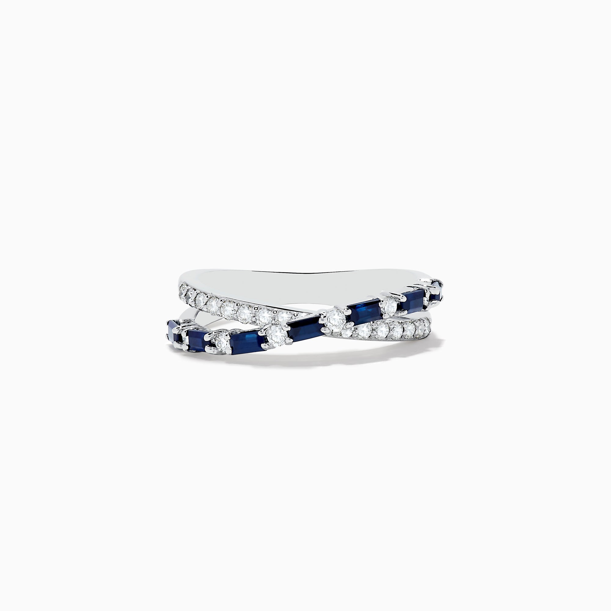 The Royale Bleu 14K White Gold Blue Sapphire and Diamond Crossover Ring features a wavy, crisscross design with alternating blue sapphires and round white diamonds on the bands, displayed on a plain white background.