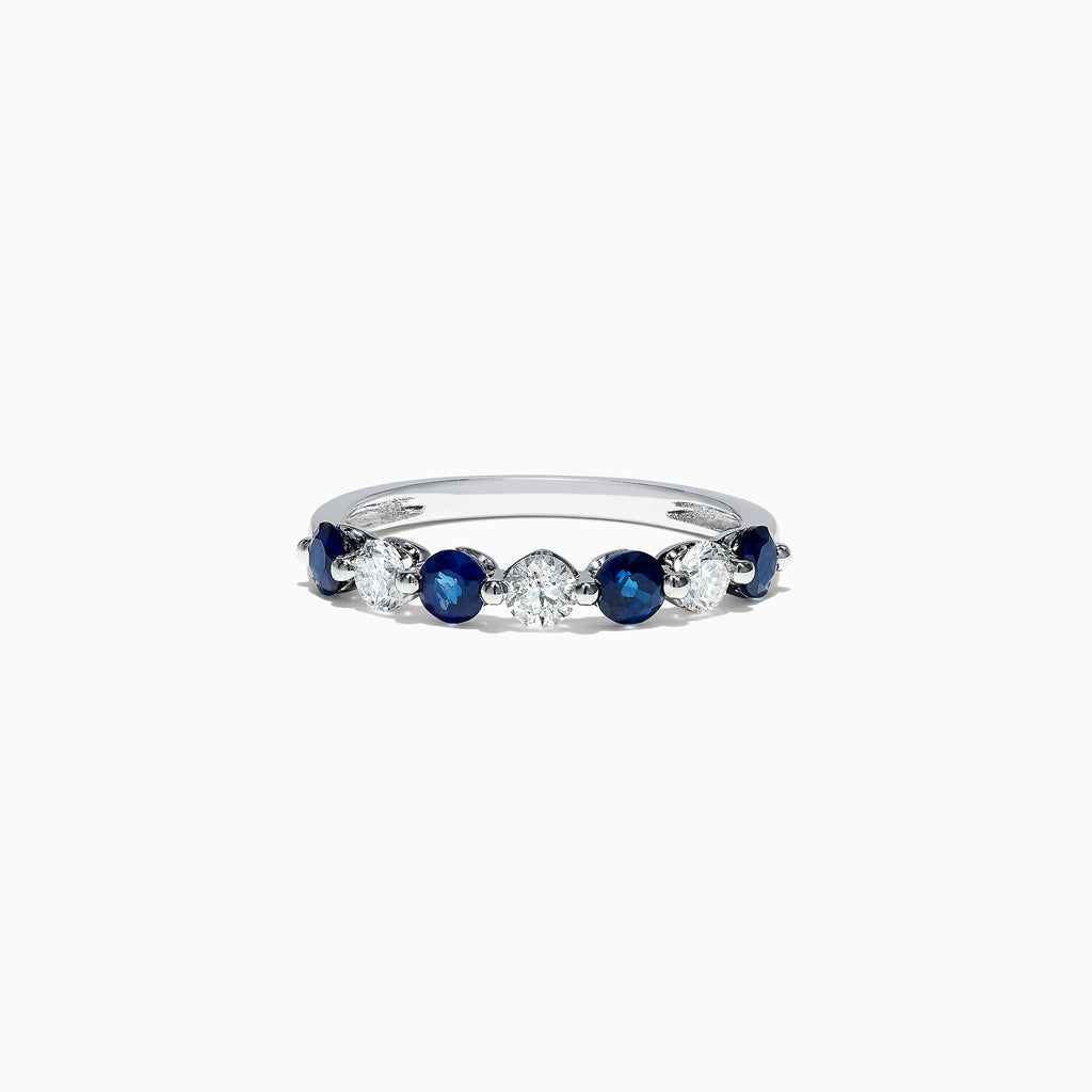 The Royale Bleu 14K White Gold Blue Sapphire and Diamond Ring (0.96 TCW) showcases alternating round blue sapphires and white diamonds set in a row along the band, displayed on a white background.