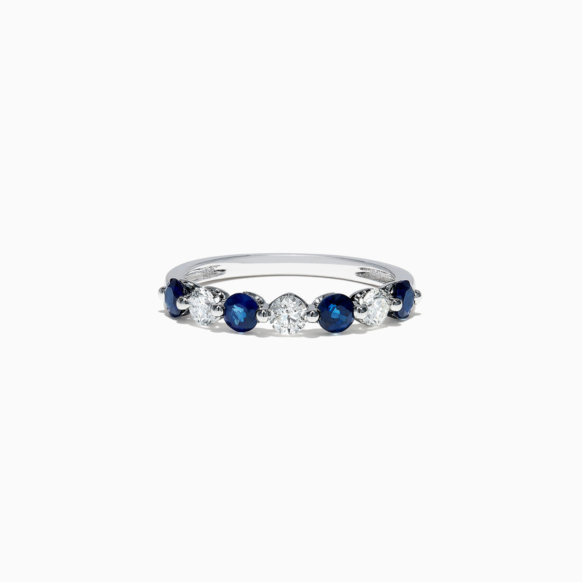 The Royale Bleu 14K White Gold Blue Sapphire and Diamond Ring (0.96 TCW) showcases alternating round blue sapphires and white diamonds set in a row along the band, displayed on a white background.