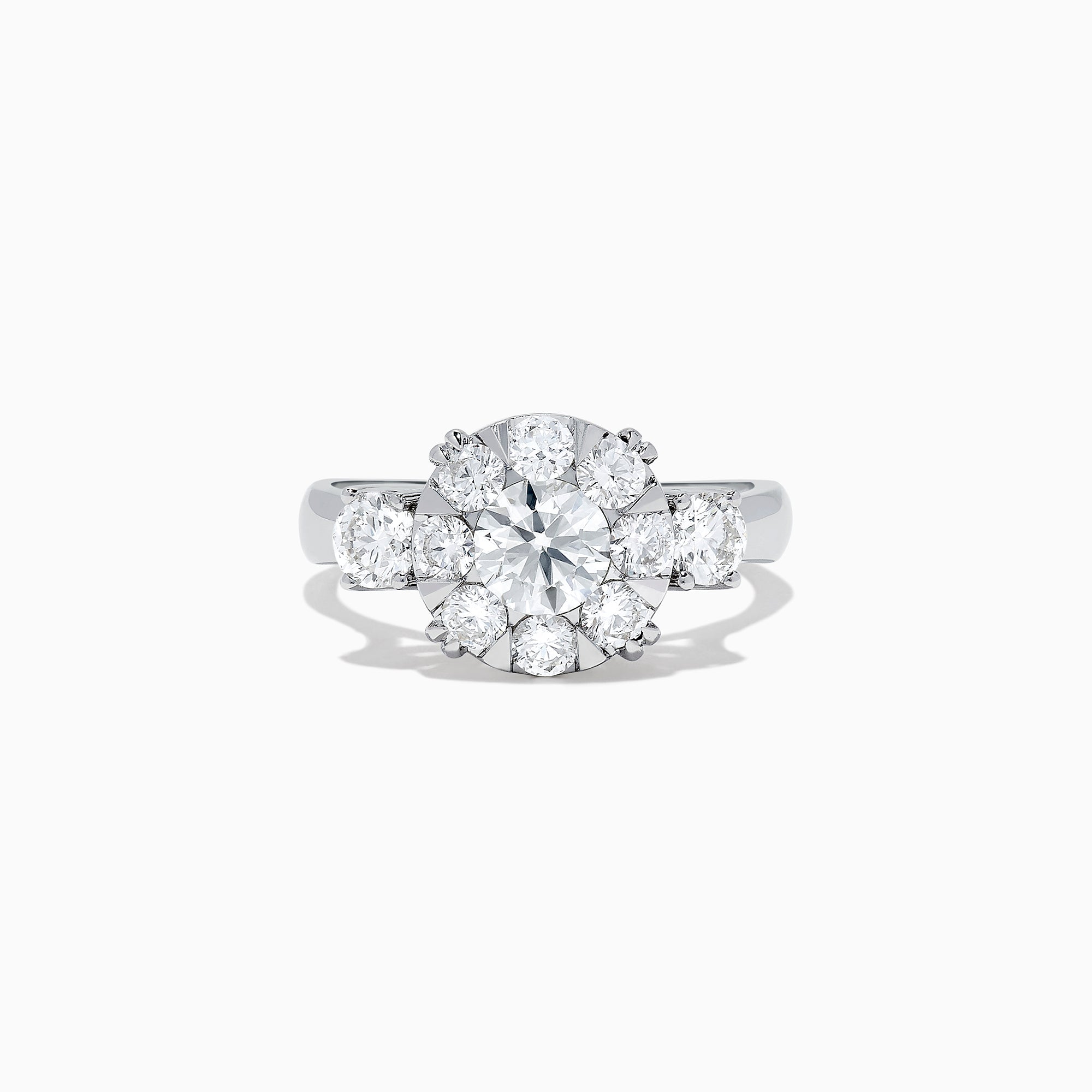 The Bouquet 14K White Gold Diamond Engagement Ring features a large round center diamond, a halo of sparkling stones, and diamonds along the band for added brilliance. Shown on a white background. Total carat weight: 1.91 TCW.