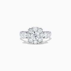 The Bouquet 14K White Gold Diamond Engagement Ring features a large round center diamond, a halo of sparkling stones, and diamonds along the band for added brilliance. Shown on a white background. Total carat weight: 1.91 TCW.