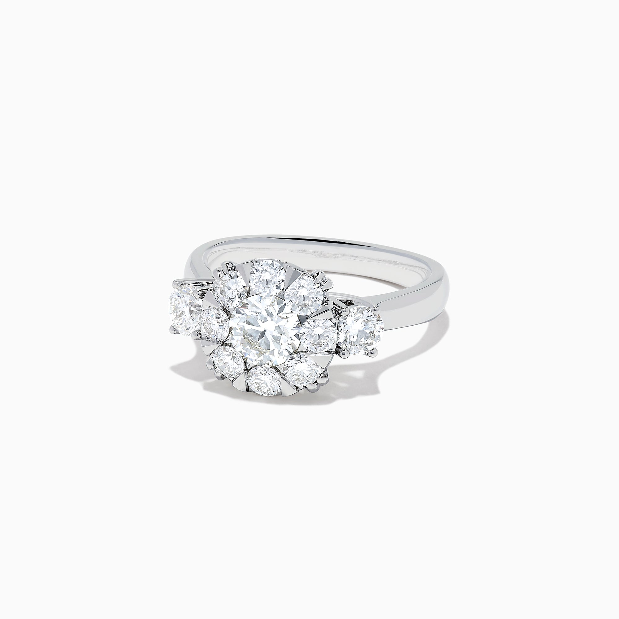 The Bouquet 14K White Gold Diamond Engagement Ring features a large round center diamond, a halo of sparkling stones, and diamonds along the band for added brilliance. Shown on a white background. Total carat weight: 1.91 TCW.